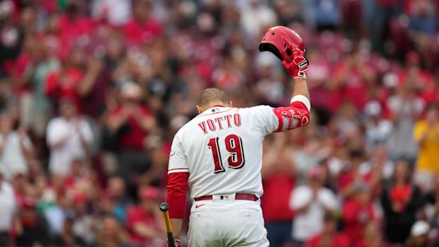 Cincinnati Reds first baseman Joey Votto (19) is recognized by the crowd before his first at-bat of the season in the second inning of a baseball game between the Colorado Rockies and the Cincinnati Reds, Monday, June 19, 2023, at Great American Ball Park in Cincinnati.  